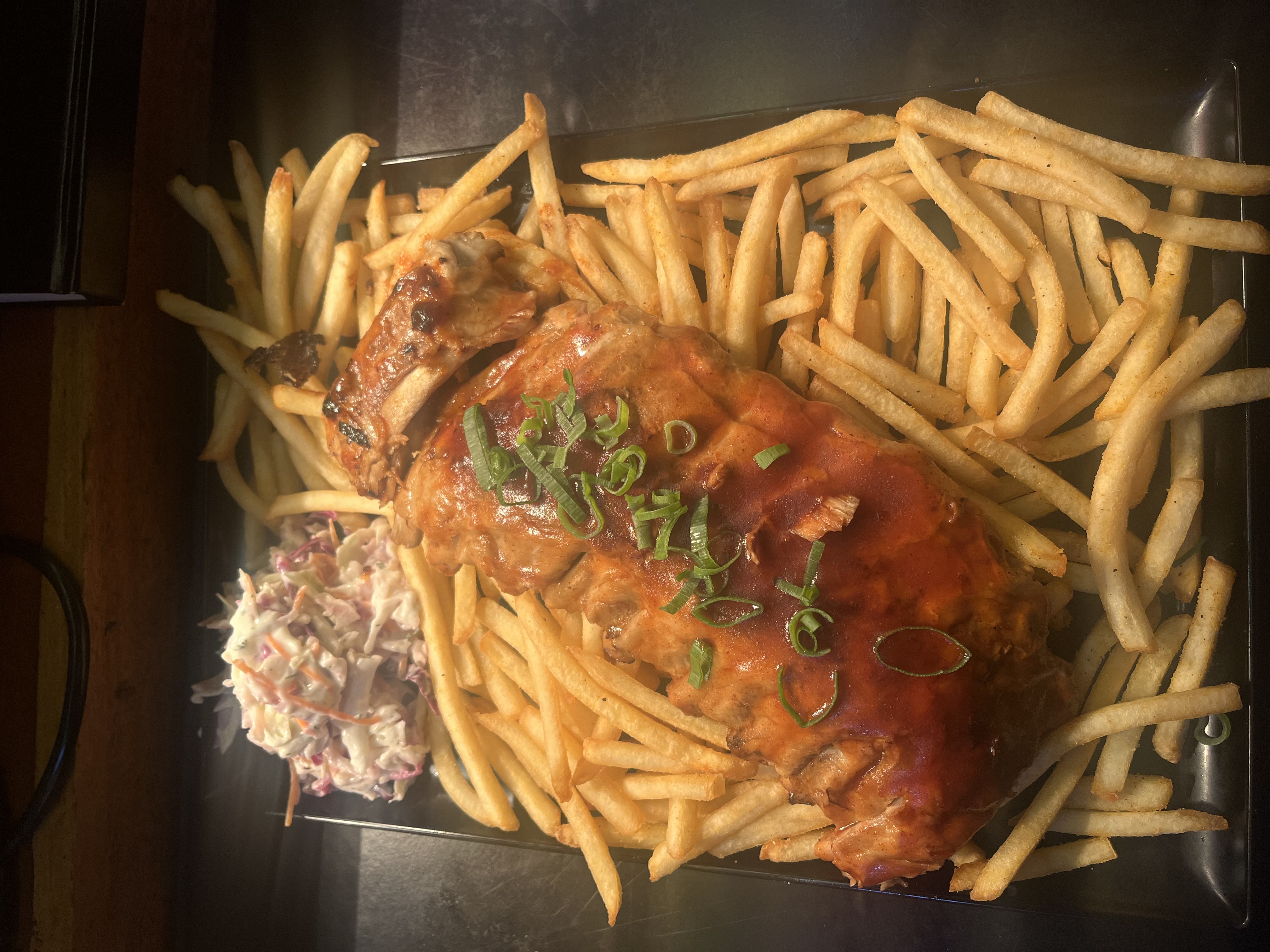 BBQ pork ribs with fries and slaw